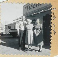  Perry Woodson's Hardware Store in Corona, CA. From left to right is Perry Woodson Turner (1893-1972). and wife, Mary Bulah Speed Turner (1894-1982). Unknown lady.